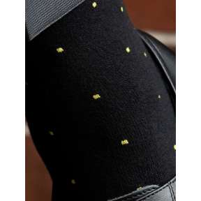 Черные носки с желтыми точками
